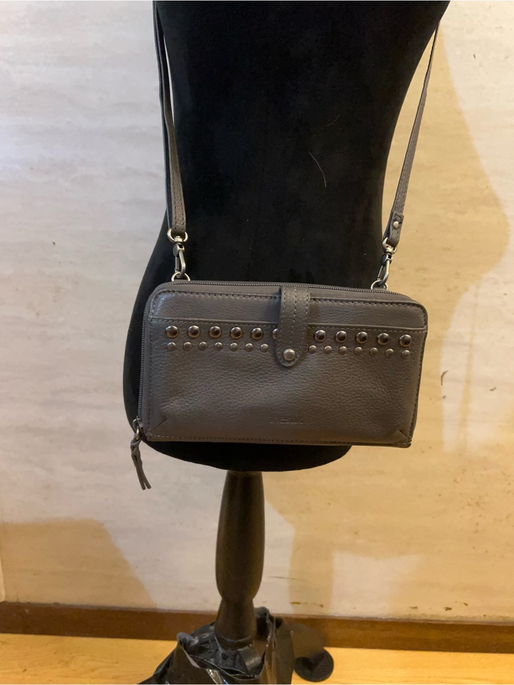 The Sak Flora Shoulder Bag A dark gray/slate studded leather finish.
